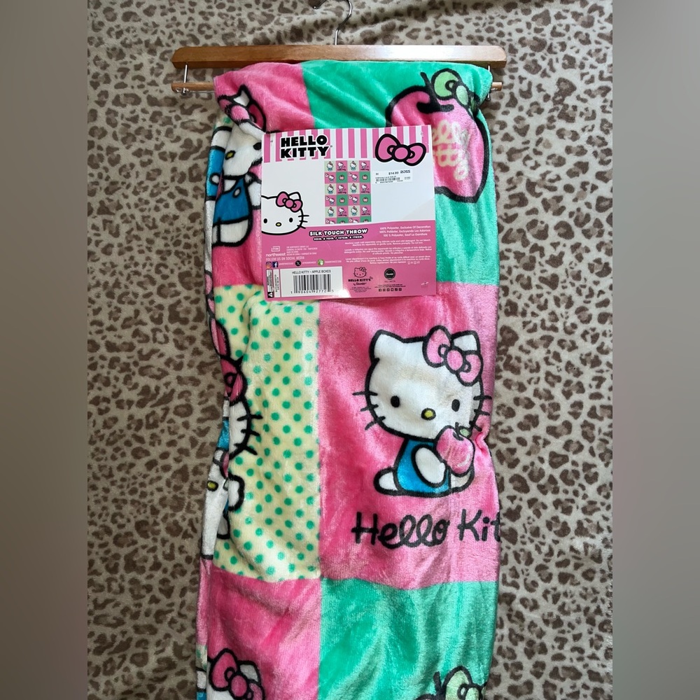 Hello kitty apple throw pink and green Ross